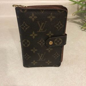 Louis Vuitton wallet that holds  passport